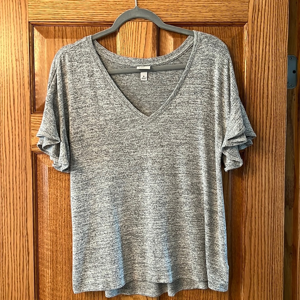 A new day flowy arm shirt